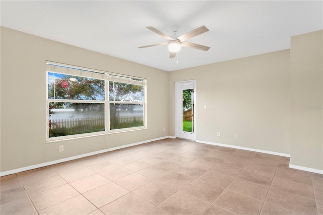 11813 Colyar Ln, Parrish, FL 34219 - unfurnished room featuring ceiling fan and light tile patterned floors