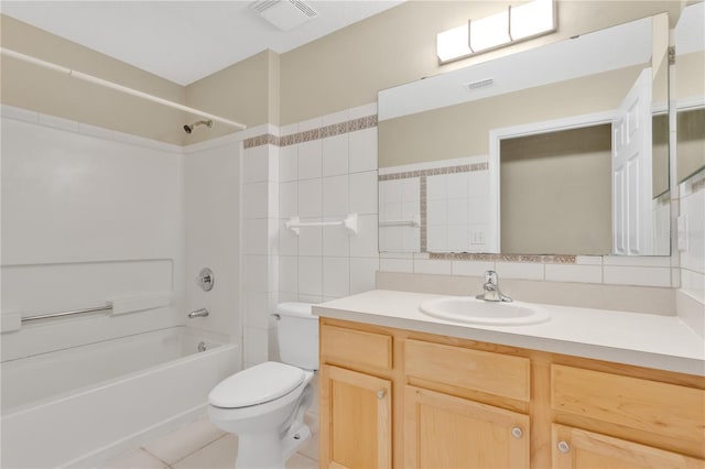 11813 Colyar Ln, Parrish, FL 34219 - bathroom with vanity, tile walls,  shower combination, tile patterned floors, and decorative backsplash