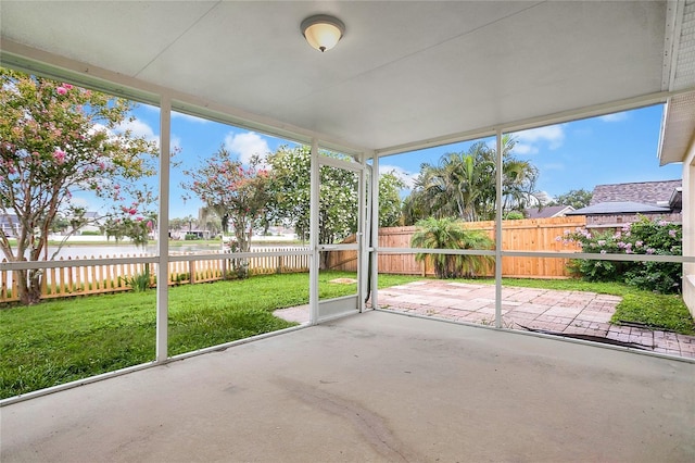 11813 Colyar Ln, Parrish, FL 34219 - unfurnished sunroom featuring a water view