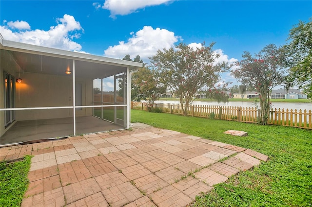 11813 Colyar Ln, Parrish, FL 34219 - view of patio / terrace with a sunroom and a water view