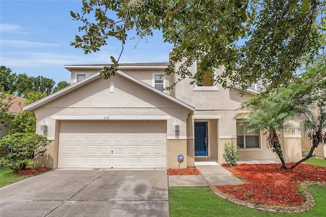 316 Crichton St, Ruskin, FL 33570 - view of front of property featuring stucco siding, driveway, and a garage