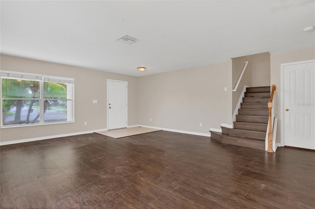 316 Crichton St, Ruskin, FL 33570 - unfurnished living room with stairway and wood finished floors