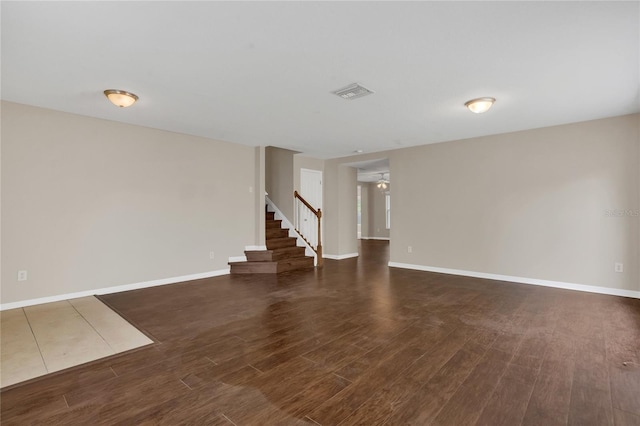 316 Crichton St, Ruskin, FL 33570 - basement with stairs and dark wood finished floors