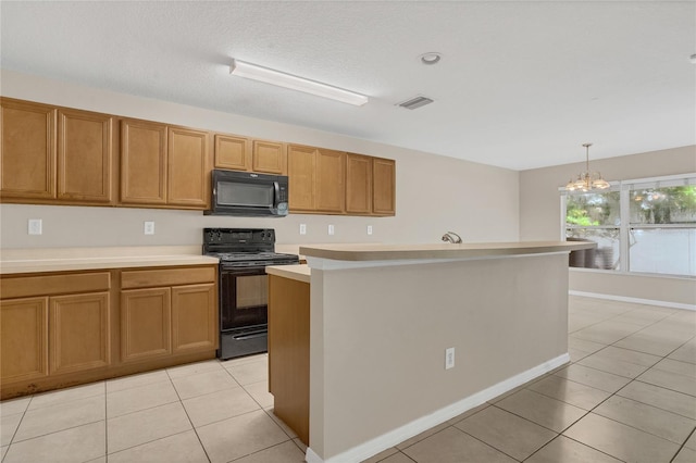 316 Crichton St, Ruskin, FL 33570 - kitchen featuring black appliances, a chandelier, light countertops, light tile patterned floors, and brown cabinets