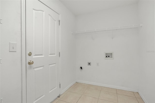 316 Crichton St, Ruskin, FL 33570 - laundry room with hookup for an electric dryer, washer hookup, and light tile patterned floors