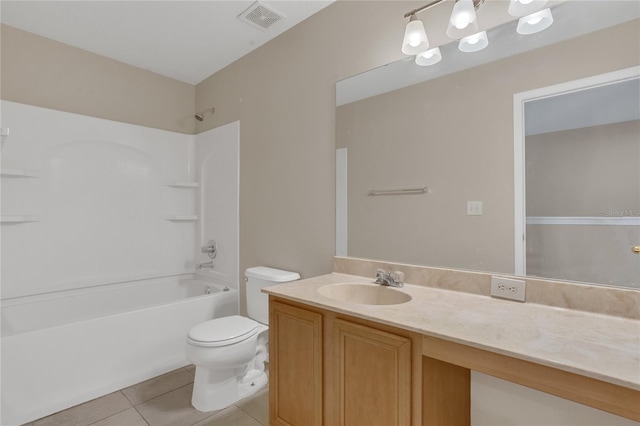 316 Crichton St, Ruskin, FL 33570 - bathroom featuring tile patterned floors, vanity, and bathing tub / shower combination