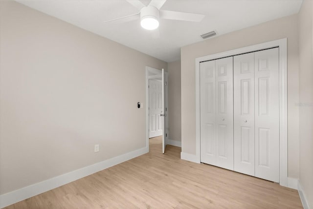 213 Flagler Ave, Edgewater, FL 32132 - unfurnished bedroom featuring light wood-type flooring, a closet, and ceiling fan