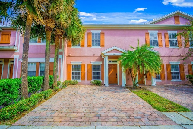 2426 Caravelle Cir, Kissimmee, FL 34746 - view of front of home featuring stucco siding and driveway