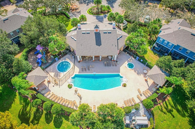 2426 Caravelle Cir, Kissimmee, FL 34746 - aerial view of property and surrounding area featuring a pool area