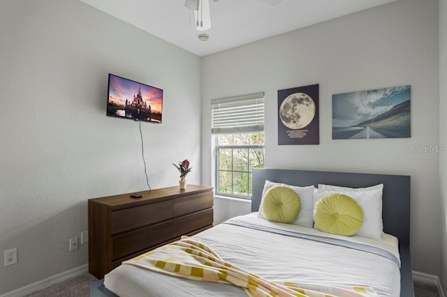 2426 Caravelle Cir, Kissimmee, FL 34746 - bedroom with carpet flooring and ceiling fan