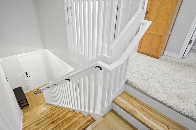 2426 Caravelle Cir, Kissimmee, FL 34746 - staircase with baseboards