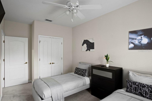2426 Caravelle Cir, Kissimmee, FL 34746 - carpeted bedroom featuring a closet and a ceiling fan