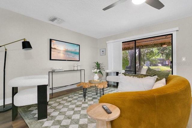 2318 Inagua Way, Winter Park, FL 32792 - living room featuring wood finished floors and a ceiling fan