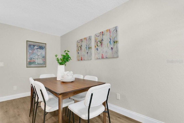 2318 Inagua Way, Winter Park, FL 32792 - dining area featuring light wood-type flooring and baseboards