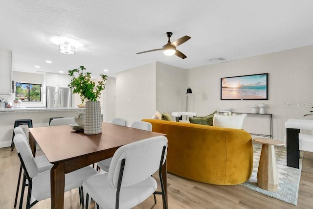 2318 Inagua Way, Winter Park, FL 32792 - dining space featuring light wood-style flooring, ceiling fan, and recessed lighting