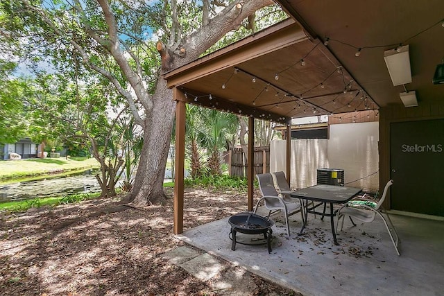 2318 Inagua Way, Winter Park, FL 32792 - view of patio / terrace featuring a fire pit