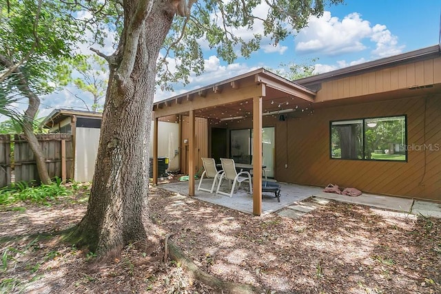 2318 Inagua Way, Winter Park, FL 32792 - rear view of house with a patio area