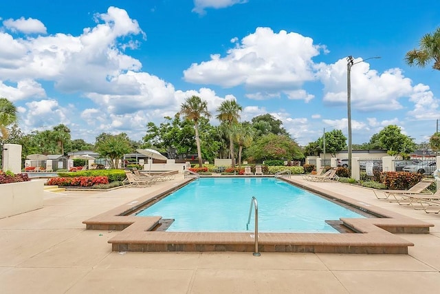 2318 Inagua Way, Winter Park, FL 32792 - community pool featuring a patio