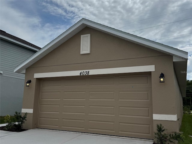 4038 Sagefield Dr, Harmony, FL 34773 - garage with driveway
