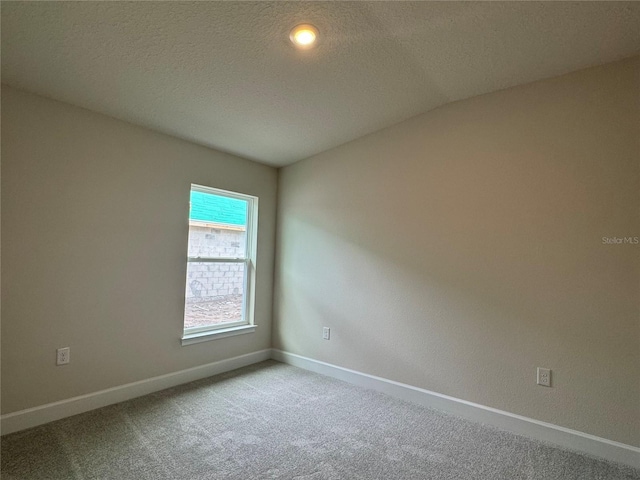 4038 Sagefield Dr, Harmony, FL 34773 - unfurnished room featuring carpet floors and a textured ceiling