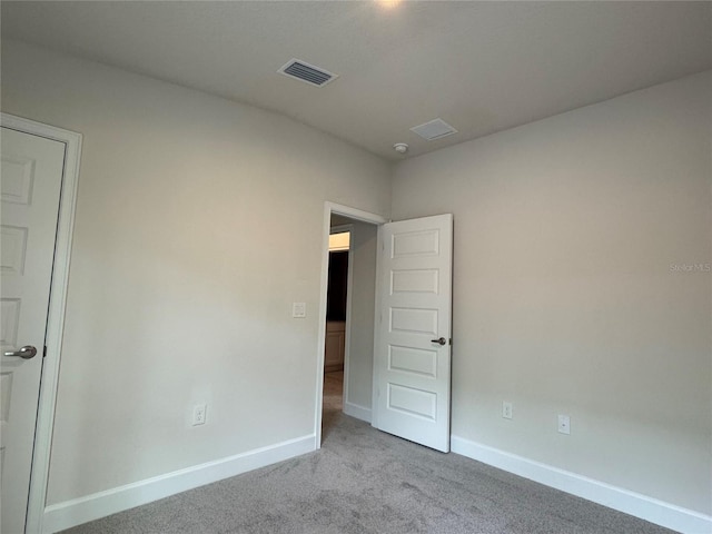 4038 Sagefield Dr, Harmony, FL 34773 - unfurnished bedroom with carpet floors and baseboards
