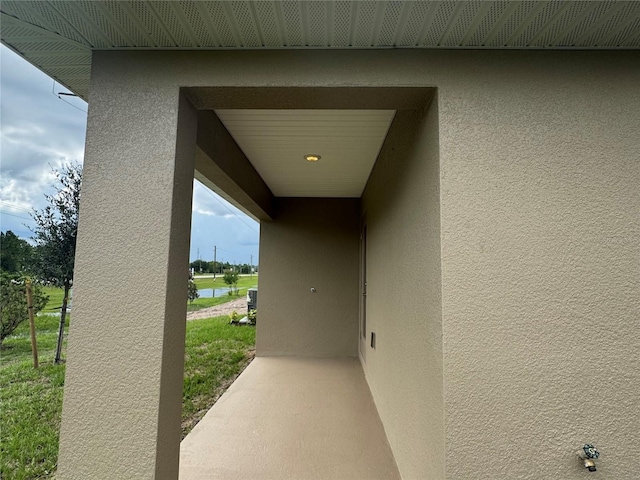 4038 Sagefield Dr, Harmony, FL 34773 - doorway to property with stucco siding