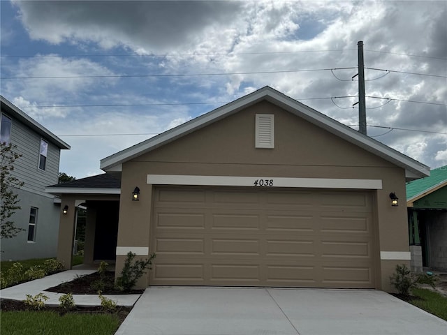 4038 Sagefield Dr, Harmony, FL 34773 - single story home with stucco siding, concrete driveway, and a garage