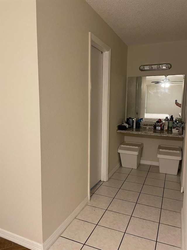 532 Koala Dr, Kissimmee, FL 34759 - bathroom with tile patterned floors and a textured ceiling