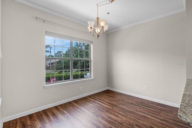 4881 Cypress Woods Dr Unit 3203, Orlando, FL 32811 - spare room with a chandelier, dark wood-type flooring, ornamental molding, and a textured ceiling
