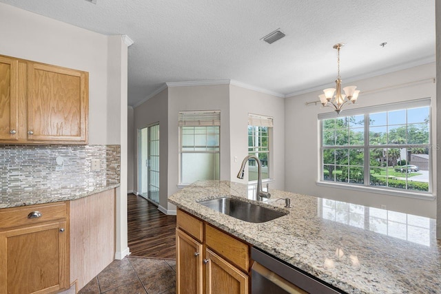 4881 Cypress Woods Dr Unit 3203, Orlando, FL 32811 - kitchen with decorative backsplash, a chandelier, decorative light fixtures, dark tile patterned flooring, and light stone counters