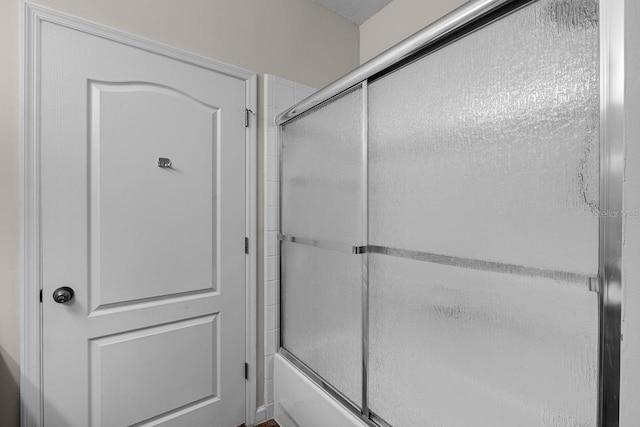 4881 Cypress Woods Dr Unit 3203, Orlando, FL 32811 - bathroom with combined bath / shower with glass door