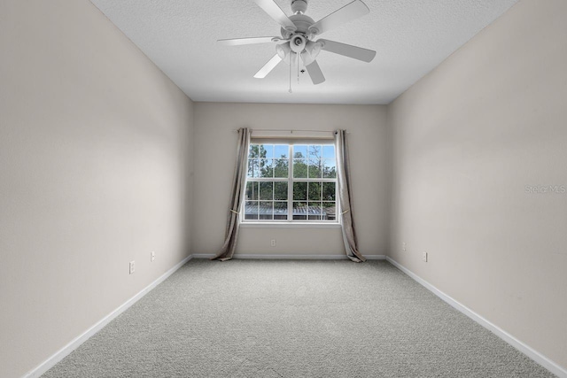 4881 Cypress Woods Dr Unit 3203, Orlando, FL 32811 - spare room featuring carpet, ceiling fan, and a textured ceiling
