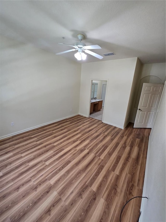 3001 Laurel Run Ln Unit 203, Kissimmee, FL 34741 - empty room featuring ceiling fan and wood finished floors