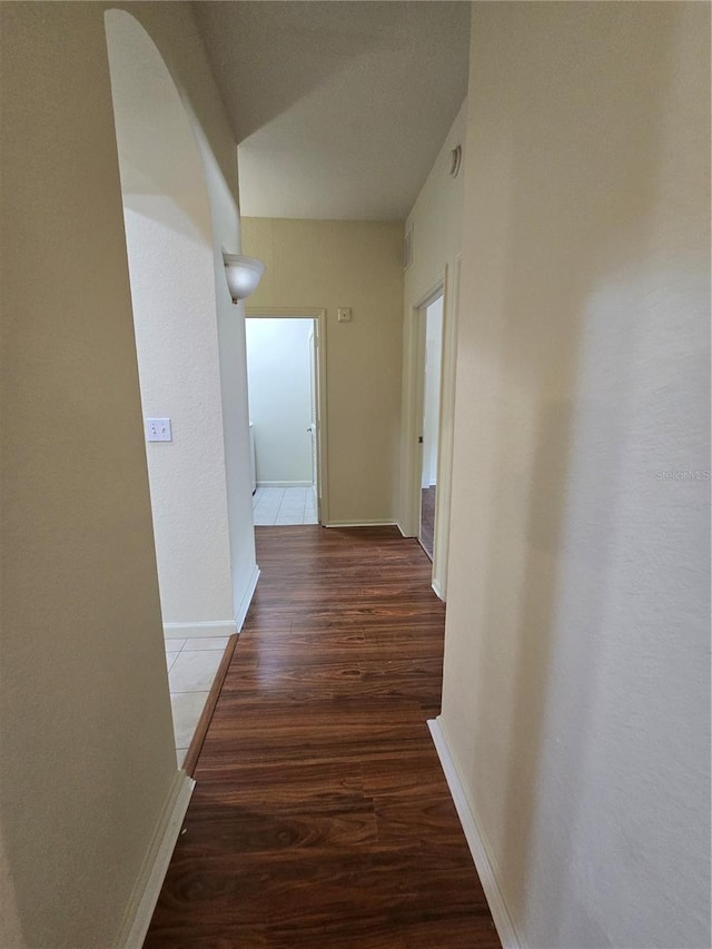 3001 Laurel Run Ln Unit 203, Kissimmee, FL 34741 - hallway featuring wood finished floors and baseboards