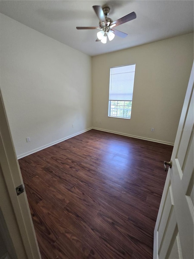 3001 Laurel Run Ln Unit 203, Kissimmee, FL 34741 - empty room featuring a ceiling fan and dark wood-style floors