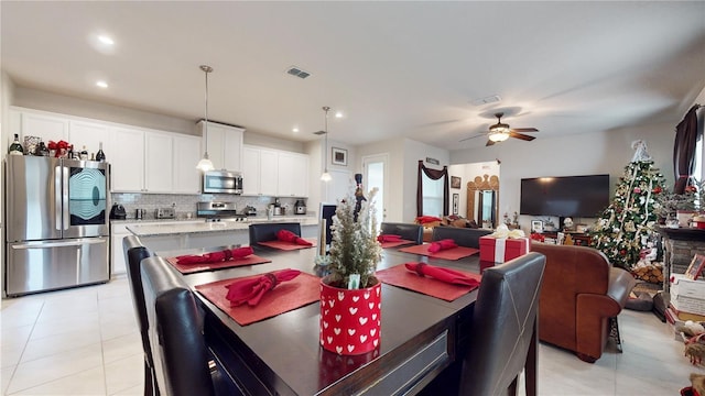 16250 Firedragon Dr, Winter Garden, FL 34787 - dining room with a ceiling fan, light tile patterned floors, and recessed lighting