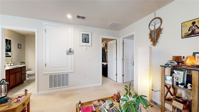 16250 Firedragon Dr, Winter Garden, FL 34787 - sitting room with light carpet and baseboards