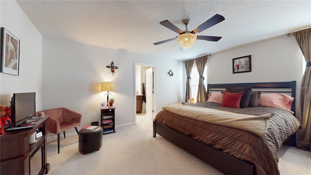 16250 Firedragon Dr, Winter Garden, FL 34787 - bedroom featuring light colored carpet, connected bathroom, ceiling fan, and a textured ceiling