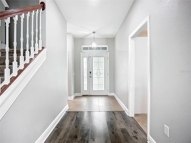 11127 Irish Moss Ave, Riverview, FL 33569 - foyer entrance with wood finished floors and stairs