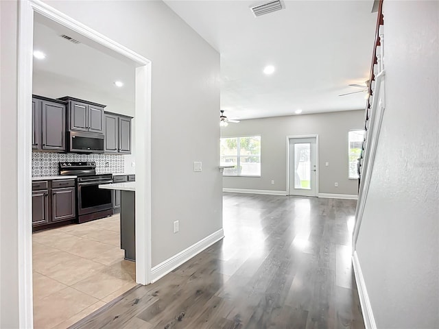 11127 Irish Moss Ave, Riverview, FL 33569 - hall with light wood-type flooring and recessed lighting