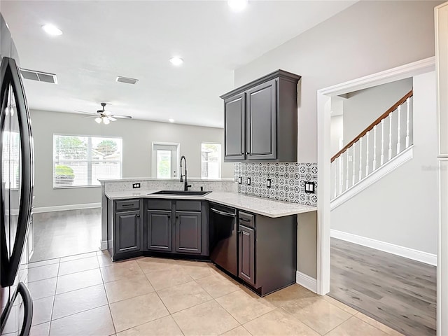 11127 Irish Moss Ave, Riverview, FL 33569 - kitchen featuring dishwasher, ceiling fan, a peninsula, healthy amount of natural light, and recessed lighting