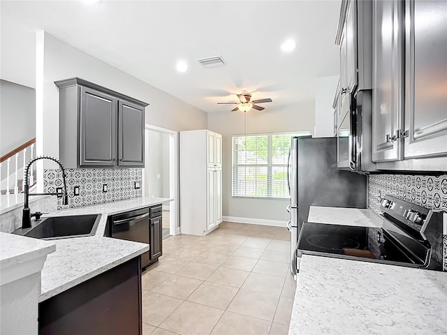 11127 Irish Moss Ave, Riverview, FL 33569 - kitchen featuring stainless steel electric range oven, dishwashing machine, ceiling fan, decorative backsplash, and recessed lighting