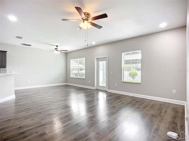 11127 Irish Moss Ave, Riverview, FL 33569 - unfurnished living room featuring a ceiling fan, dark wood-style floors, and recessed lighting