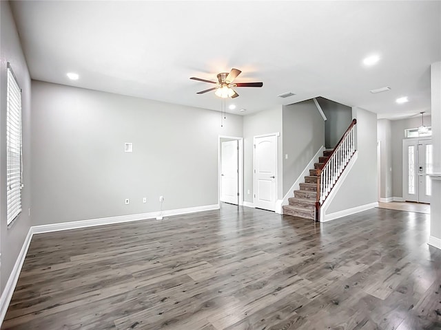 11127 Irish Moss Ave, Riverview, FL 33569 - unfurnished living room featuring stairway, a ceiling fan, wood finished floors, and recessed lighting