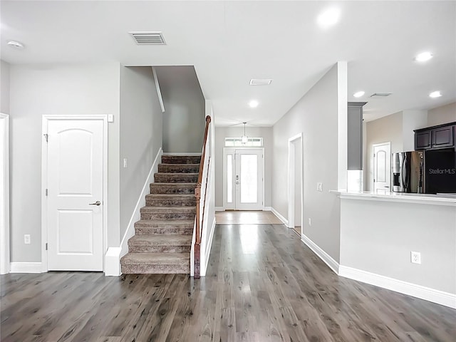 11127 Irish Moss Ave, Riverview, FL 33569 - foyer entrance featuring wood finished floors, stairway, and recessed lighting