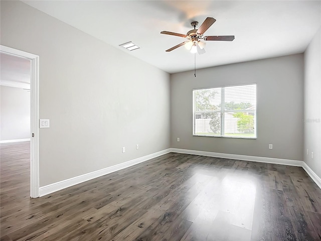 11127 Irish Moss Ave, Riverview, FL 33569 - spare room with a ceiling fan and dark wood-style flooring