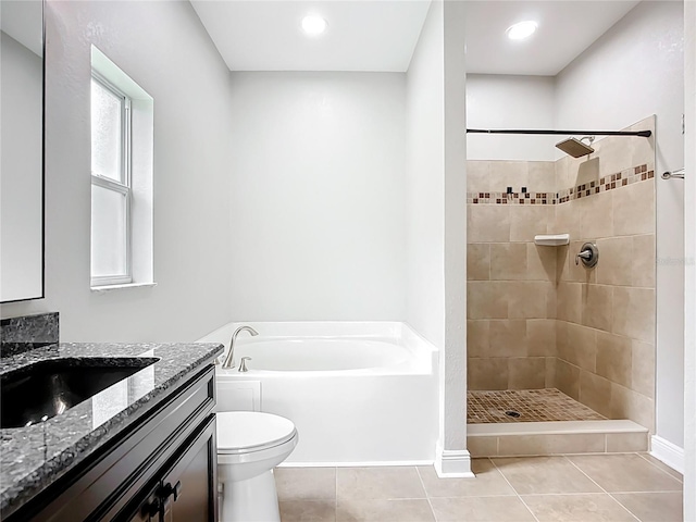11127 Irish Moss Ave, Riverview, FL 33569 - bathroom with vanity, a bath, tiled shower, and tile patterned floors