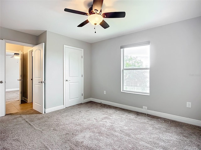 11127 Irish Moss Ave, Riverview, FL 33569 - unfurnished bedroom with carpet floors and a ceiling fan