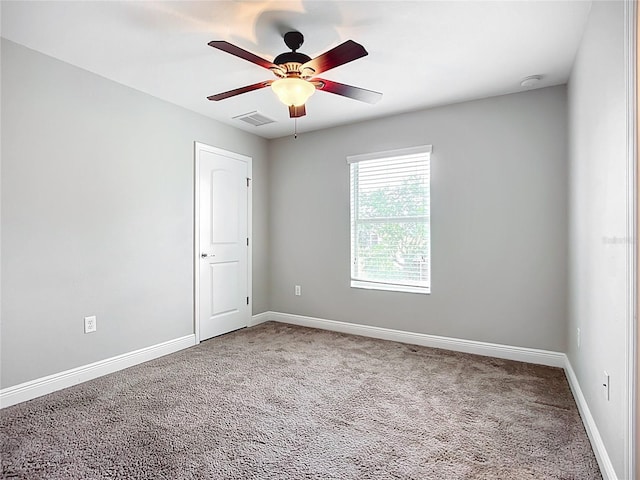 11127 Irish Moss Ave, Riverview, FL 33569 - carpeted spare room with a smoke detector and a ceiling fan