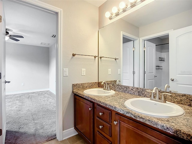 11127 Irish Moss Ave, Riverview, FL 33569 - bathroom with double vanity and a ceiling fan